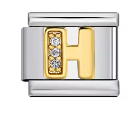 Letra H dorada con piedras sobre charm plateado